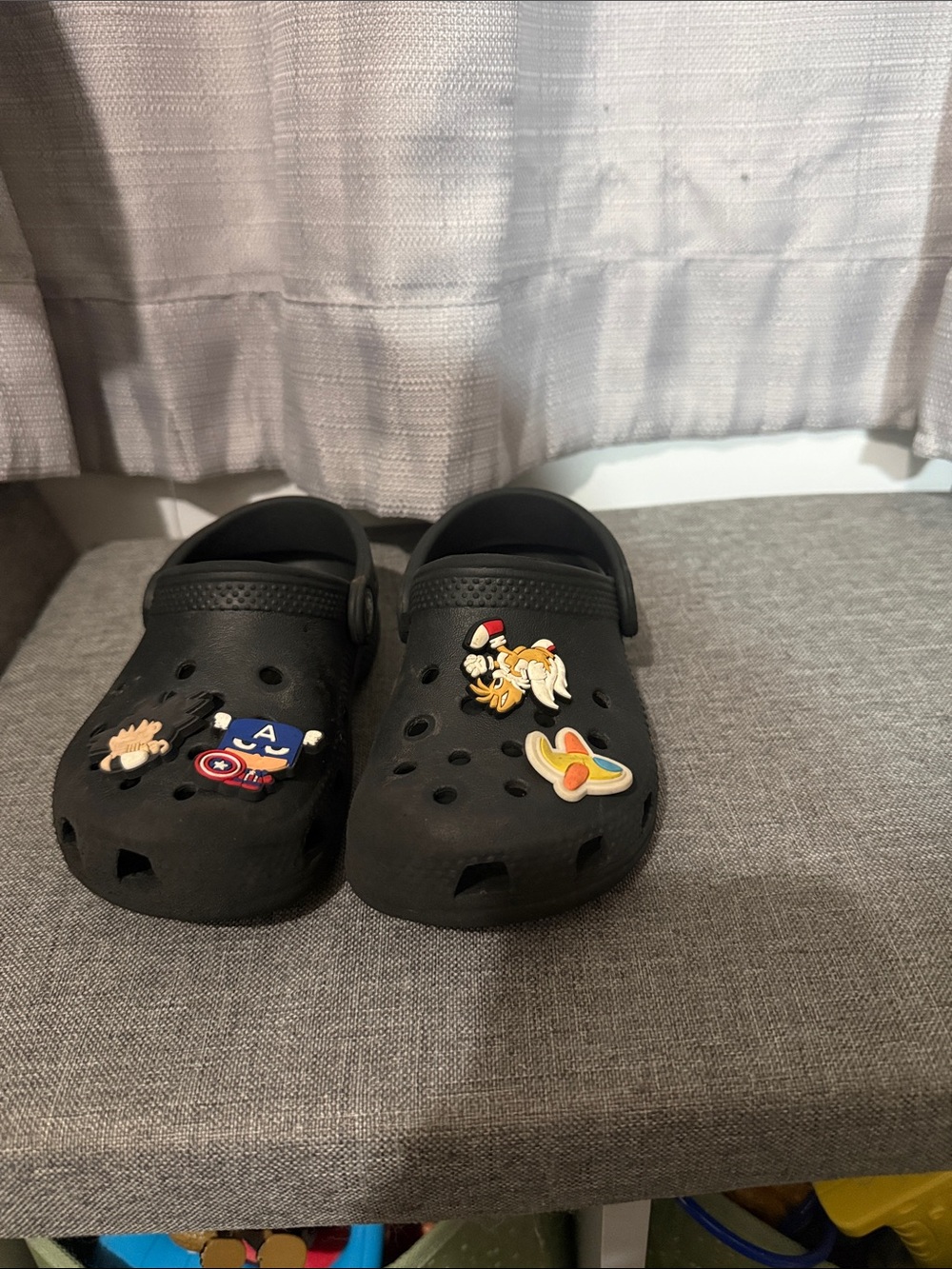 CROCS Kids Black Clogs with Colorful Character Charms